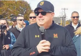  ?? PAUL W. GILLESPIE/BALTIMORE SUN MEDIA GROUP ?? Gov. Larry Hogan speaks to the crowd on the Annapolis side of Spa Creek during the annual Slaughter Across the Water tug-of-war between Annapolis and Eastport.