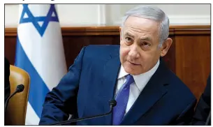  ?? AP/GALI TIBBON ?? Israeli Prime Minister Benjamin Netanyahu attends the weekly cabinet meeting at his office Sunday in Jerusalem. Israeli police on Sunday recommende­d indicting Netanyahu on bribery charges.