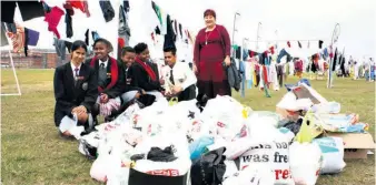  ?? ?? John Ross College principal Miss J King with her pupils, who previously heeded the call for donations at the ZO charity line in Richards Bay