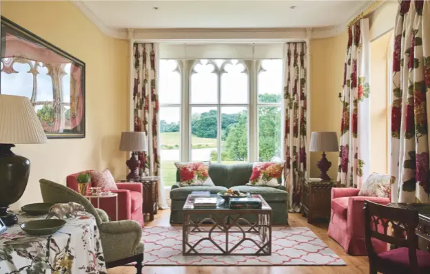  ??  ?? SITTING ROOM
The views of the mere (below and far below) inspired Nina to create the feel of an indoor garden in the sitting room. To achieve this effect, she chose an overscaled painterly hydrangea print for the curtains, which she paired with...