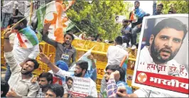  ?? AFP ?? Youth Congress activists shout slogans against PM Narendra Modi during a protest in front of BJP headquarte­rs in New Delhi on Saturday.