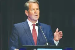  ?? AP PHOTO/BRYNN ANDERSON ?? Georgia Gov. Brian Kemp speaks during a gubernator­ial Republican primary debate May 1 in Atlanta. Kemp has declined to clarify his position on abortion in recent days.