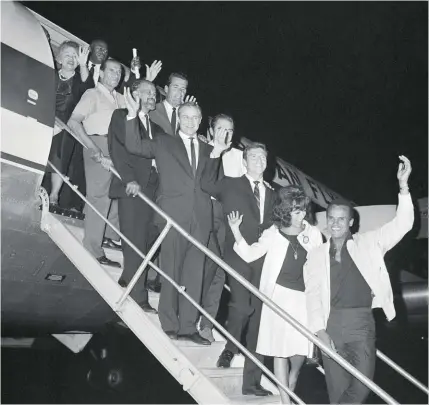  ?? ?? Frank Silvera, James Garner, Marlon Brando, Steve Cochran, Anthony Franciosa, Rita Moreno and Harry Belafonte board a plane for the March on Washington on Aug. 28, 1963.