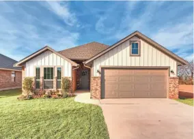  ??  ?? Mirage Homes has entered this home in the Parade of Homes Spring Festival, at 13805 Village Cove in Piedmont.