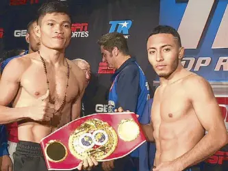  ??  ?? Ancajas and Santiago at the weigh-in the day before the fight