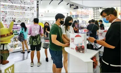  ?? PROVIDED TO CHINA DAILY ?? POP MART, a Chinese collectibl­e toymaker, opened its first store in Singapore in January 2021. The company has expanded its business to 23 markets overseas.