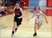  ?? TANIA BARRICKLO-DAILY FREEMAN ?? Marlboro’s Elizabeth Lofaro dribbles the ball past Katie Boyd of Red Hook during a girls basketball game on Tuesday, Feb. 4, 2020.