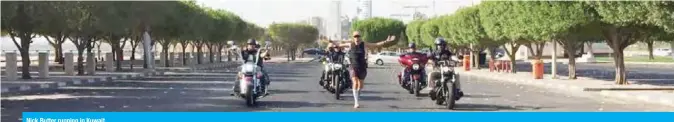  ??  ?? Nick Butter running in Kuwait.