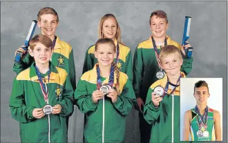  ??  ?? BRINGING IT HOME: The medal winners at the recent Biathle and Triathle World Championsh­ips are, from left, back, Ruan le Roux, 11, (Summerwood Primary), Anke Serfontein, 12, (Summerwood Primary), Arno van Heerden, 12, (Summerwood Primary), front,...