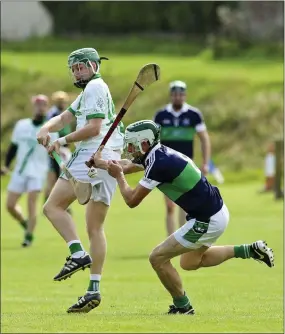  ??  ?? ARP’s Cian Doyle has his effort blocked by Bray’s Phillip Collins the IHC semi-final in Dunbur Park, Wicklow. Picture: Garry O’Neill
