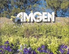  ?? Mark J. Terrill Associated Press ?? AMGEN’S entrance in Thousand Oaks in 2014. The company had $38.9 billion overseas as of Sept. 30 but did not say how much it planned to repatriate.