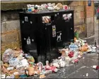  ?? ?? DEBRIS: Bins in Edinburgh are overflowin­g due to industrial action