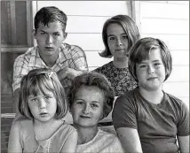  ?? AJC FILE PHOTOS ?? Gathered in the wake of Floyd Hoard’s death in 1967: his wife, Imogene, surrounded by her four children (from left) Vivian, 7; Richard, 14; Peggy Jean, 16; and Claudine, 9.