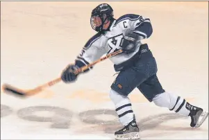  ?? SUBMITTED PHOTO/ST. FX ATHLETICS ?? Leanne MacDonald of Mabou rifles a shot during her playing days with the St. Francis Xavier X-Women. MacDonald, who played defence for the X-Women from 1998-2002, is the first X-Women hockey player to be inducted into the university’s sports hall of...