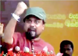  ??  ?? HOIST BLACK FLAGS FOR VESAK? YOU MUST BE OFF YOUR ROCKER, MATE: Wimal’s outrageous call to the nation at JO’s May Day Rally to drape the country in black during Vesak