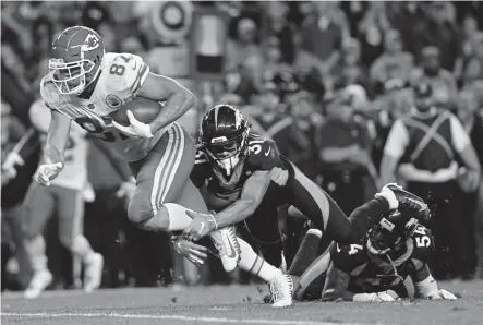  ?? Aaron Ontiveroz, The Denver Post ?? Broncos safety Justin Simmons tackles Kansas City tight end Travis Kelce during the fourth quarter last Sunday. Simmons is the only Broncos defensive player not to miss a snap through four games this season.