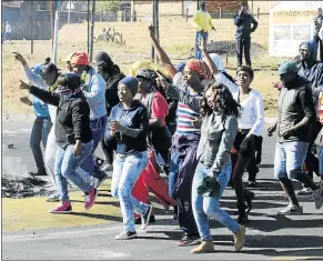  ?? Picture: SOWETAN ?? THREAT: Atteridgev­ille residents took to the streets to protest against the ANC’s choice of Thoko Didiza as the party’s mayoral candidate for the City of Tshwane. The city faces a Moody’s downgrade.