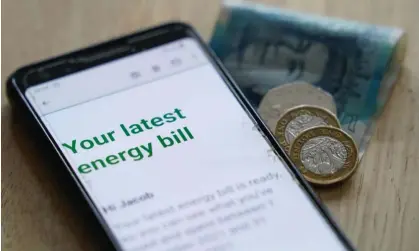  ?? Photograph: Jacob King/PA ?? Average household bills were limited to £1,277 a year ago, under Ofgem’s price cap. That had been due to rise to £3,549 from October.