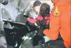  ??  ?? A still image taken from a video shows a survivor, rescued by Italian firefighte­rs, at the Hotel Rigopiano — Reuters photo