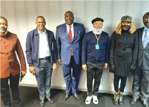  ??  ?? Some of the G40 fugitives Walter Mzembi (left), Saviour Kasukuwere (third from left) and Patrick Zhuwao(right) pose for a picture after meeting ANC officials who include secretary-general Ace Magashule (second from left) and Tony Yengeni