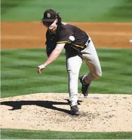  ?? RALPH FRESO GETTY IMAGES ?? Padres starter Ryan Weathers, shown earlier this spring, gives up three runs on four hits while striking out six in three innings against the Dodgers on Saturday.