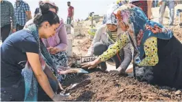  ?? ILYAS AKENGIN, AFP/ GETTY IMAGES ?? Women mourn during a funeral for victims Sunday in Gaziantep, on the border with Syria. Another 69 people were injured.