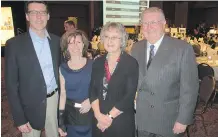  ??  ?? From left are Bill and Donna Murphy with Louise and Gordon Lang. The event raised $182,000 for programs to help dads be better dads.