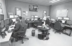  ?? ?? 911 operators receive emergency calls at the Chatham County 911 Call Center on Tuesday.