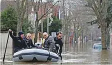  ?? Reuters ?? A resident is evacuated by Paris police divers in a flooded street in Villeneuve-Saint-Georges, near Paris, yesterday.