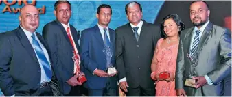  ??  ?? Award winners with HNB Assurance General Manager Marketing and Distributi­on Lalith Fernando and Manager Sales Training and Developmen­t Jehan Haniff