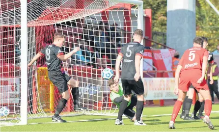  ??  ?? Leagues apart:
Larne and Ballyclare clash in the Co Antrim Shield in October but their paths have been very different since