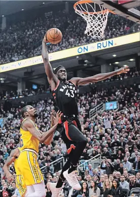  ?? CANADIAN PRESS FILE PHOTO ?? The Raptors’ Pascal Siakam uses the spin to get past his opponents and in position for the big dunk.