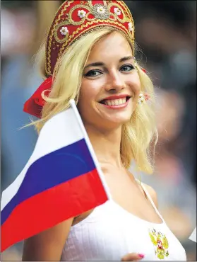  ?? — GETTY IMAGES ?? A Communist Party lawmaker is imploring Russian women, such as this fan at Friday’s game in Moscow, to not have sex with foreigners and risk having an unwanted pregnancy.
