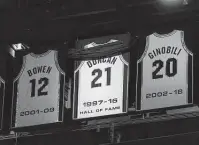  ?? Eric Gay / Associated Press ?? The Naismith Memorial Basketball Hall of Fame jersey for Tim Duncan is unveiled after the Spurs game against the Phoenix Suns at the AT&T Center on Saturday.