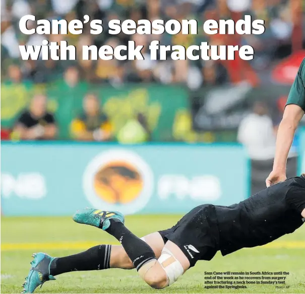  ?? Photo / AP ?? Sam Cane will remain in South Africa until the end of the week as he recovers from surgery after fracturing a neck bone in Sunday’s test against the Springboks.