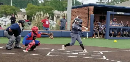  ?? Staff photo by Josh Richert ?? ■ Liberty-Eylau’s Savanna Phelps connects during Game 1 of a Class 4A area series against Bullard on Thursday at East Texas Baptist University in Marshall, Texas.