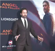  ?? Photo — AFP file ?? Scottish actor Gerard Butler arrives for the Los Angeles premiere of ‘Angel Has Fallen’ at the Regency Village theatre in Westwood, California.