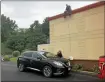  ?? NICHOLAS BUONANNO — MEDIANEWS GROUP FILE ?? A customer in the drive-thru at the Dunkin’ Donuts in Brunswick makes a donation to Special Olympics New York during the annual Cops on Top fundraiser.