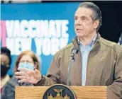  ?? SETH WENIG/AP ?? New York Gov. Andrew Cuomo speaks at the opening Wednesday of a mass COVID-19 vaccinatio­n site in the Queens borough of New York City.