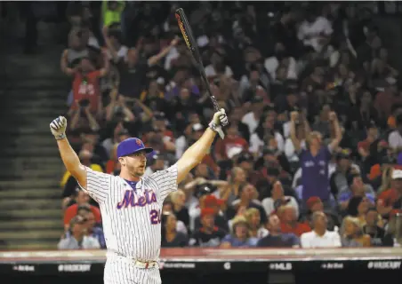  ?? Gregory Shamus / Getty Images ?? Mets rookie first baseman Pete Alonso won the Home Run Derby, edging each of his three opponents by a single homer.