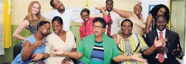  ??  ?? Members of the TEACH Caribbean team and the JN Foundation show their fun side during a prize-giving ceremony for students over the summer. From left (front row) are Eva Coleman, maths teacher, Horace Clarke High; Nicole Clarke, TEACH Caribbean; Esther...