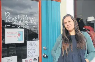  ?? ANDREW ROBINSON/SALTWIRE NETWORK ?? Jane Manuel manages Posie Row, a shop specializi­ng in jewelry, accessorie­s, clothing and handmade goods in downtown St. John's, N.L.