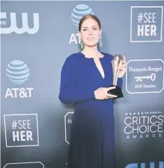  ??  ?? Amy Adams poses backstage with her Best Actress in a Movie Made for TV or Limited Series award for ‘Sharp Objects’. • (Below) Kristen Bell arrives at the ceremony.