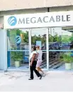  ??  ?? Estrategia.
Megacable y Axtel anunciaron en agosto pasado la concentrac­ión de los servicios de TV de paga, internet y telefonía en 16 mercados.