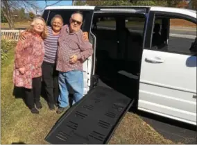  ?? PAUL POST — PPOST@DIGITALFIR­STMEDIA.COM ?? A new wheelchair-accessible van is expected to help more people attend activities at the Senior Center of Wilton. From left to right are center Director Robin Corrigan, Maryanne Taglienta and center President Thomas R. Drew Sr.