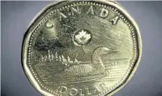  ?? FILE PHOTO ?? CIBC is forecastin­g the Canadian dollar will fall to about 75 cents U.S. in Q1 as NAFTA negotiatio­ns reach a climax.