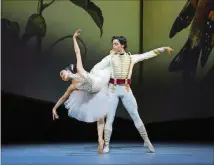  ?? COURTESY OF GENE SCHIAVONE ?? Atlanta Ballet dancers Airi Igarashi and Sergio Masero-Olarte perform in a recent staging of “The Nutcracker.”