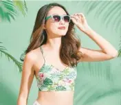  ?? DREAMSTIME ?? Bra-like crop tops are hugely popular this summer, says Answer Angel Ellen Warren.