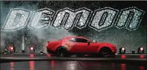  ?? JULIE JACOBSON / ASSOCIATED PRESS ?? The 2018 Dodge Challenger SRT Demon is unveiled Tuesday during a media preview for the New York Internatio­nal Auto Show in New York City.
