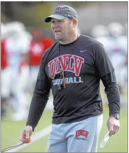  ?? Ellen Schmidt Las Vegas Review-journal @ellenschmi­dttt ?? UNLV coach Barry Odom says the difference between the first day and where the Rebels are now in spring practice is like night and day at every position.